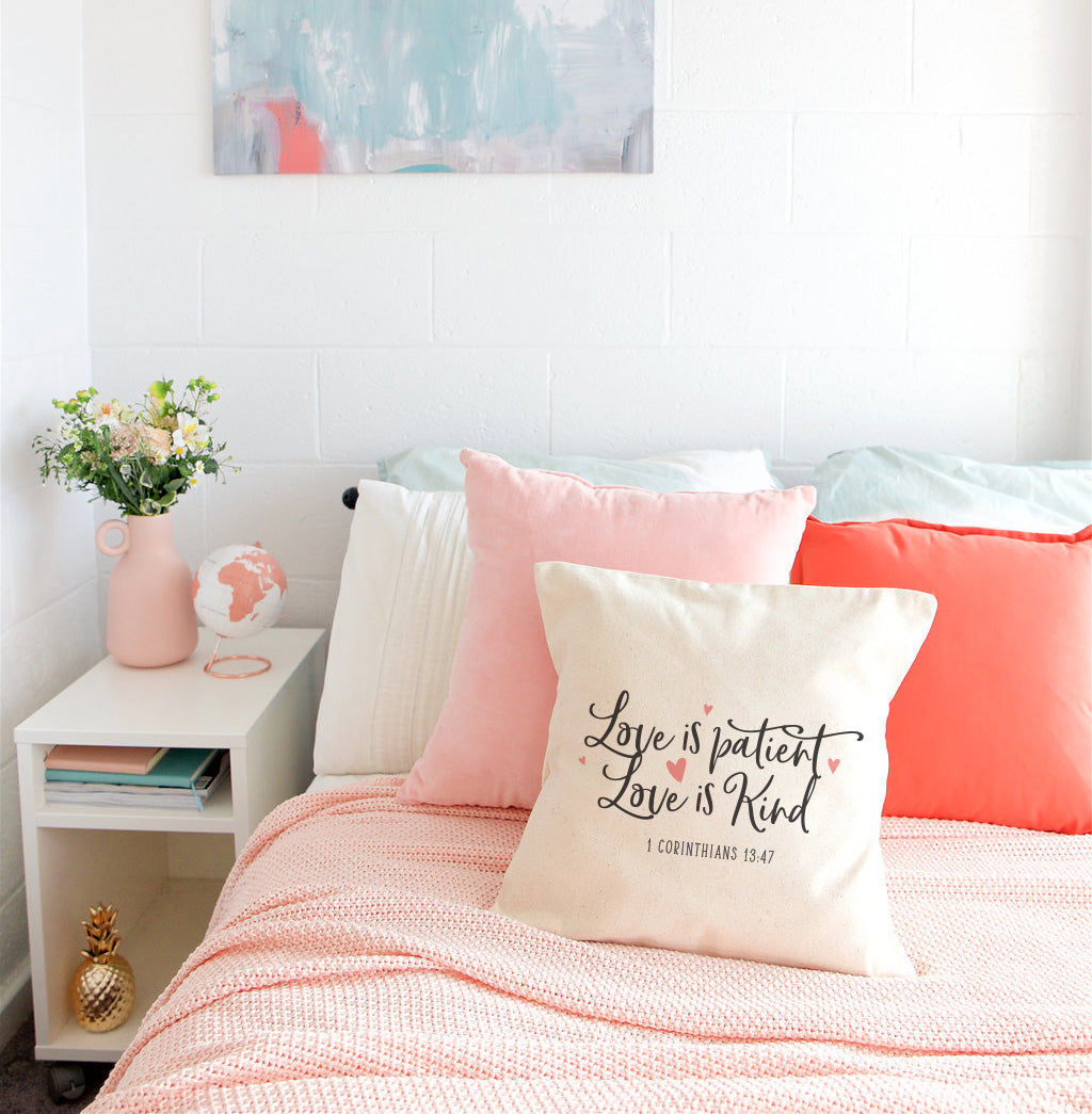 Love is patient. Love is kind. 1 Corinthians 13:47 Pillow Cover from The Cotton & Canvas Co.
