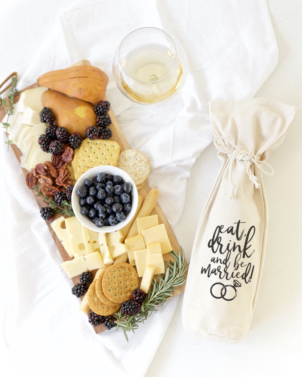 Eat, Drink and Be Married Cotton Canvas Wine Bag from The Cotton & Canvas Co.