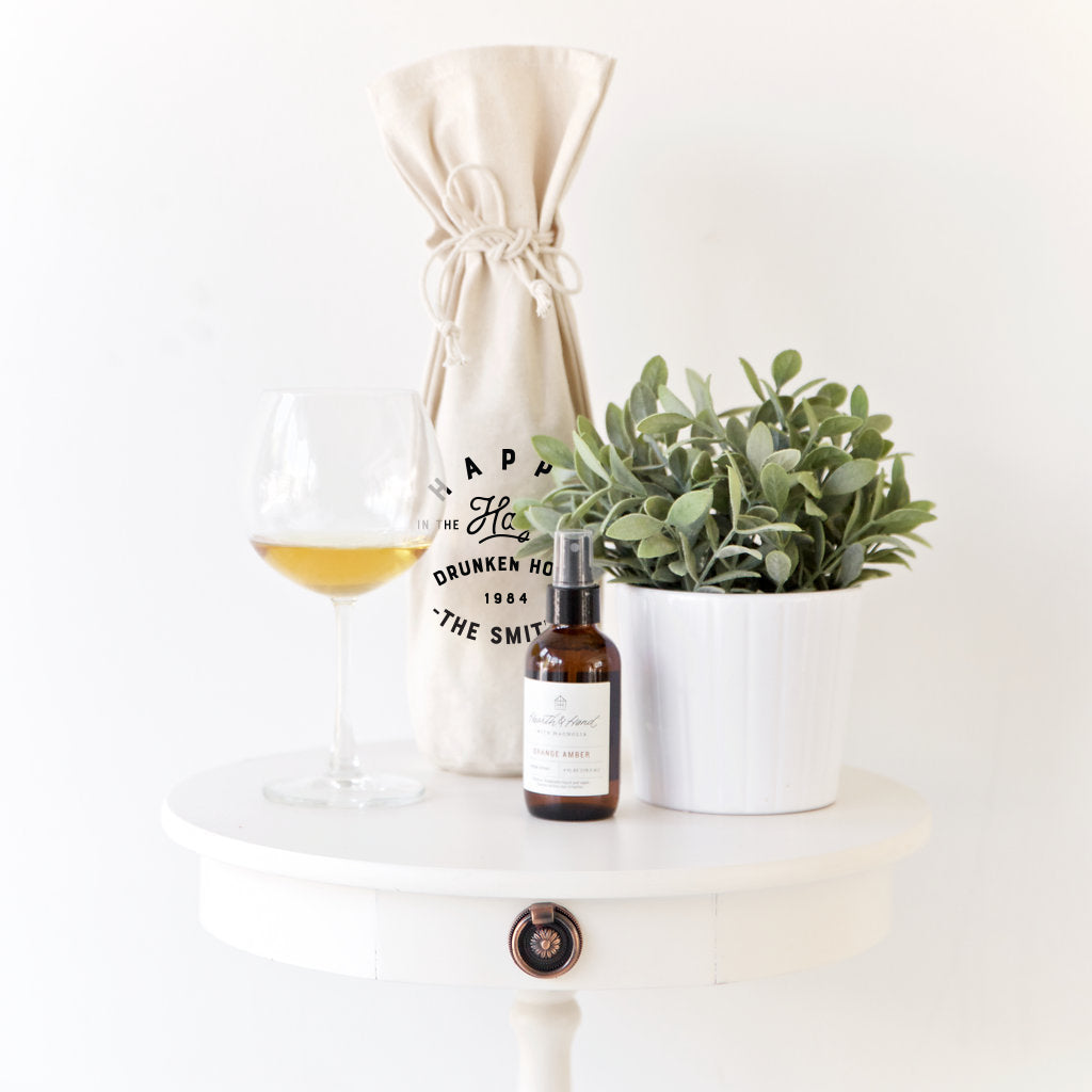 Happy in the Haze of a Drunken Hour Cotton Canvas Wine Bag from The Cotton & Canvas Co.