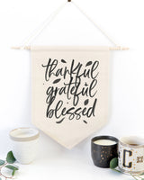Thankful, Grateful, Blessed Hanging Wall Banner from The Cotton & Canvas Co.