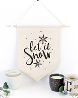 Let It Snow Hanging Wall Banner from The Cotton & Canvas Co.