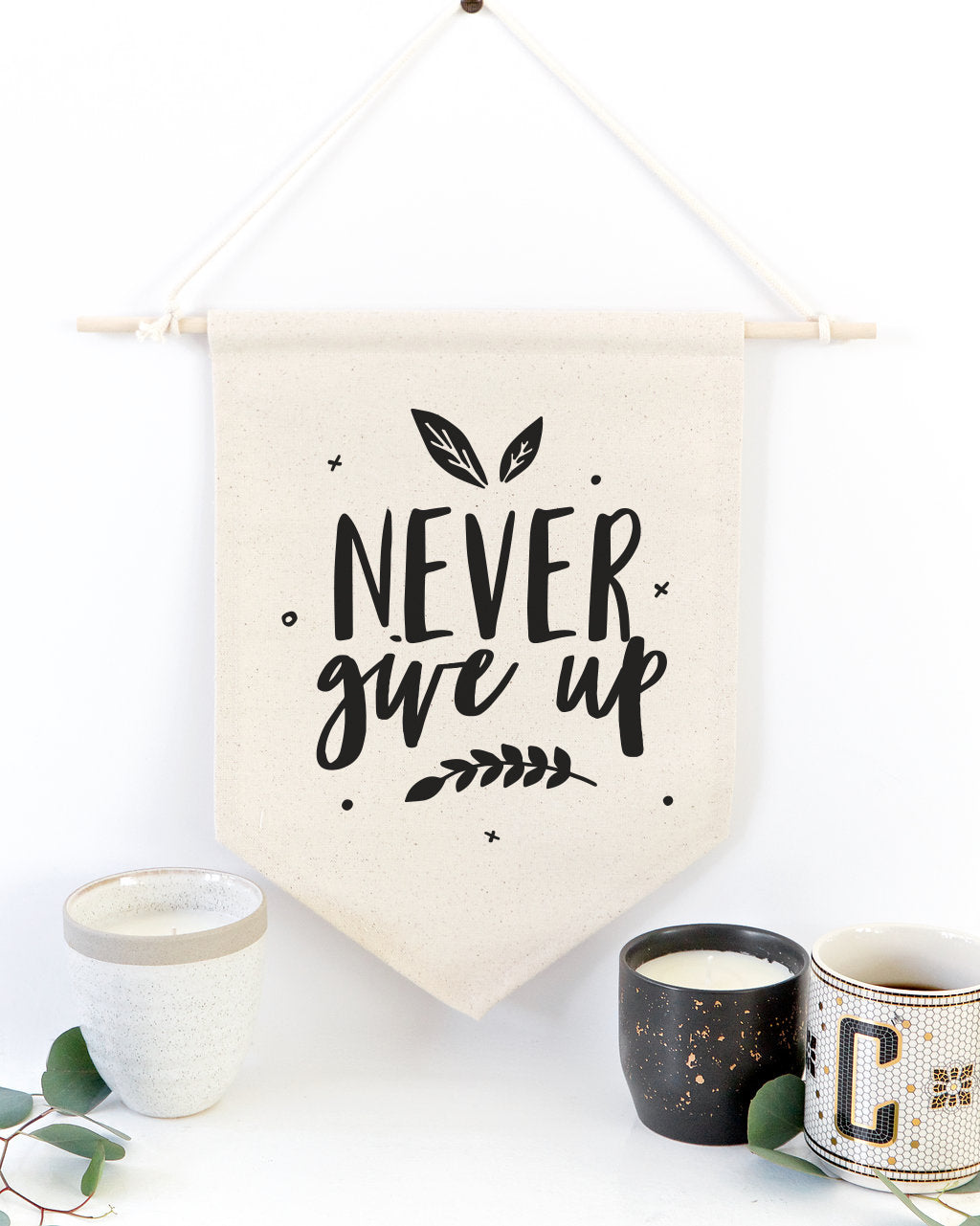 Never Give Up Hanging Wall Banner from The Cotton & Canvas Co.