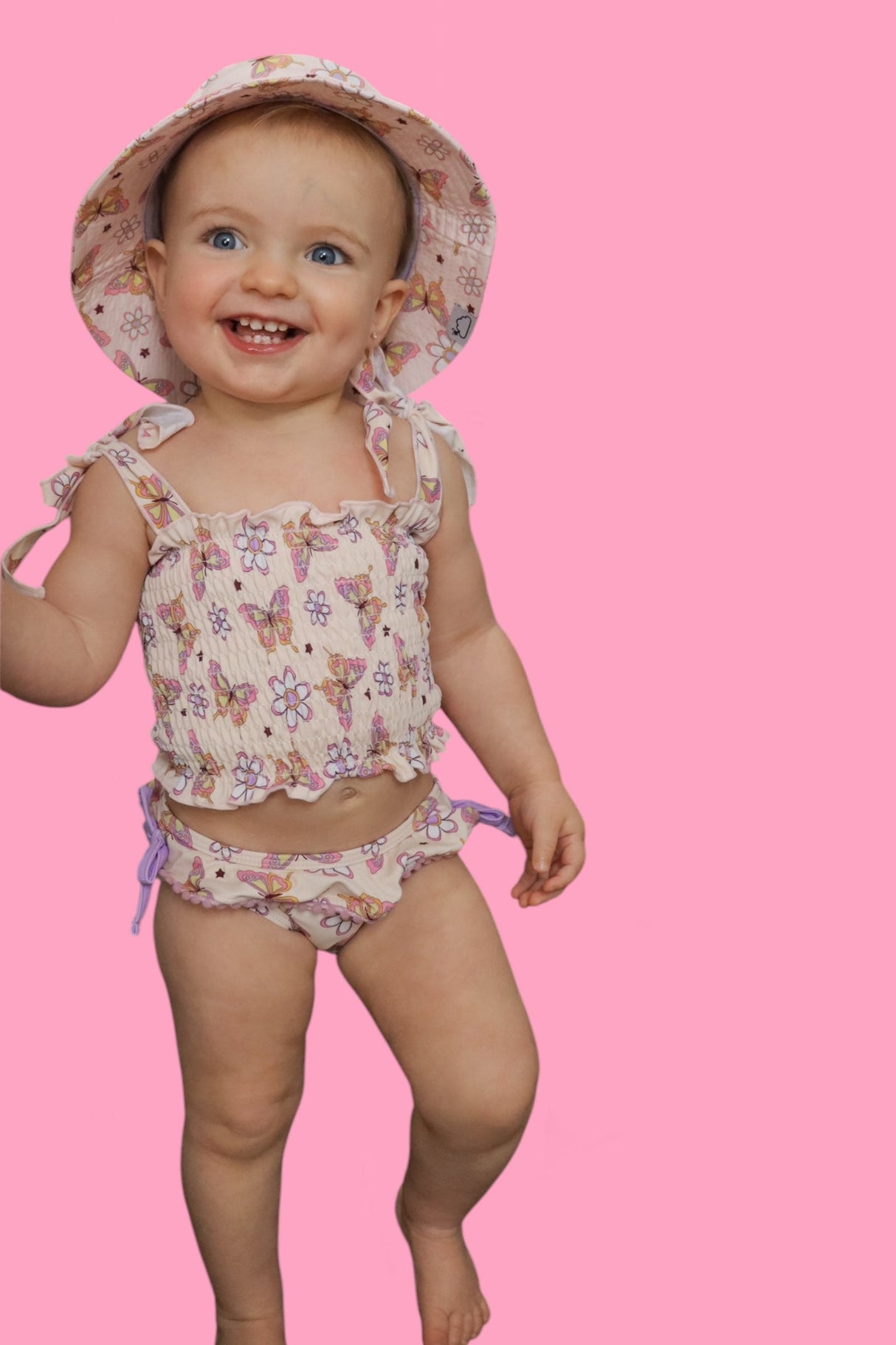 BLOSSOMIN’ BUTTERFLY DREAM SMOCKED TANKINI TWO PIECE SWIM SUIT from DREAM BIG LITTLE CO