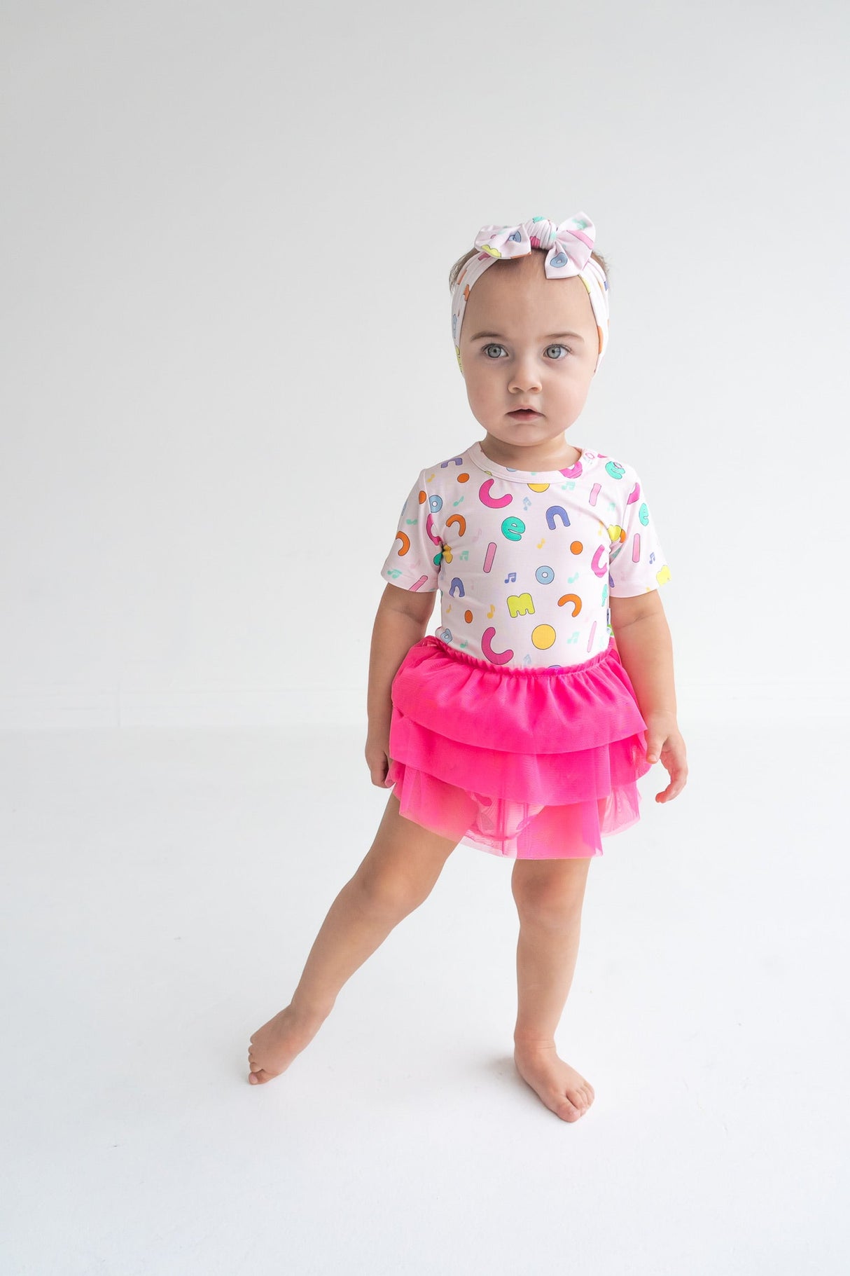 Dream Big Little Co x CoComelon ALPHABET DREAM TUTU SHORT SLEEVE BODYSUIT DRESS from DREAM BIG LITTLE CO