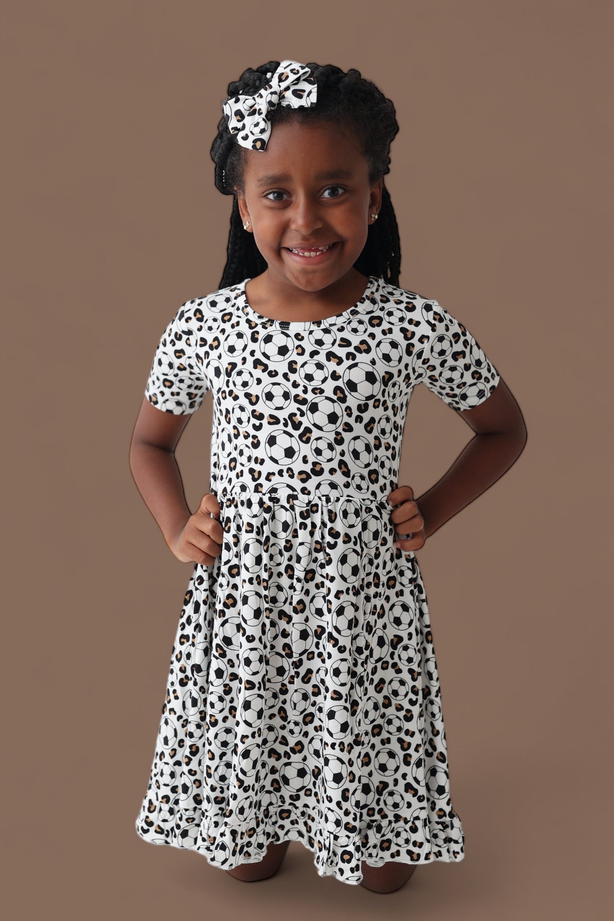 WILD GOALS DREAM RUFFLE DRESS from DREAM BIG LITTLE CO