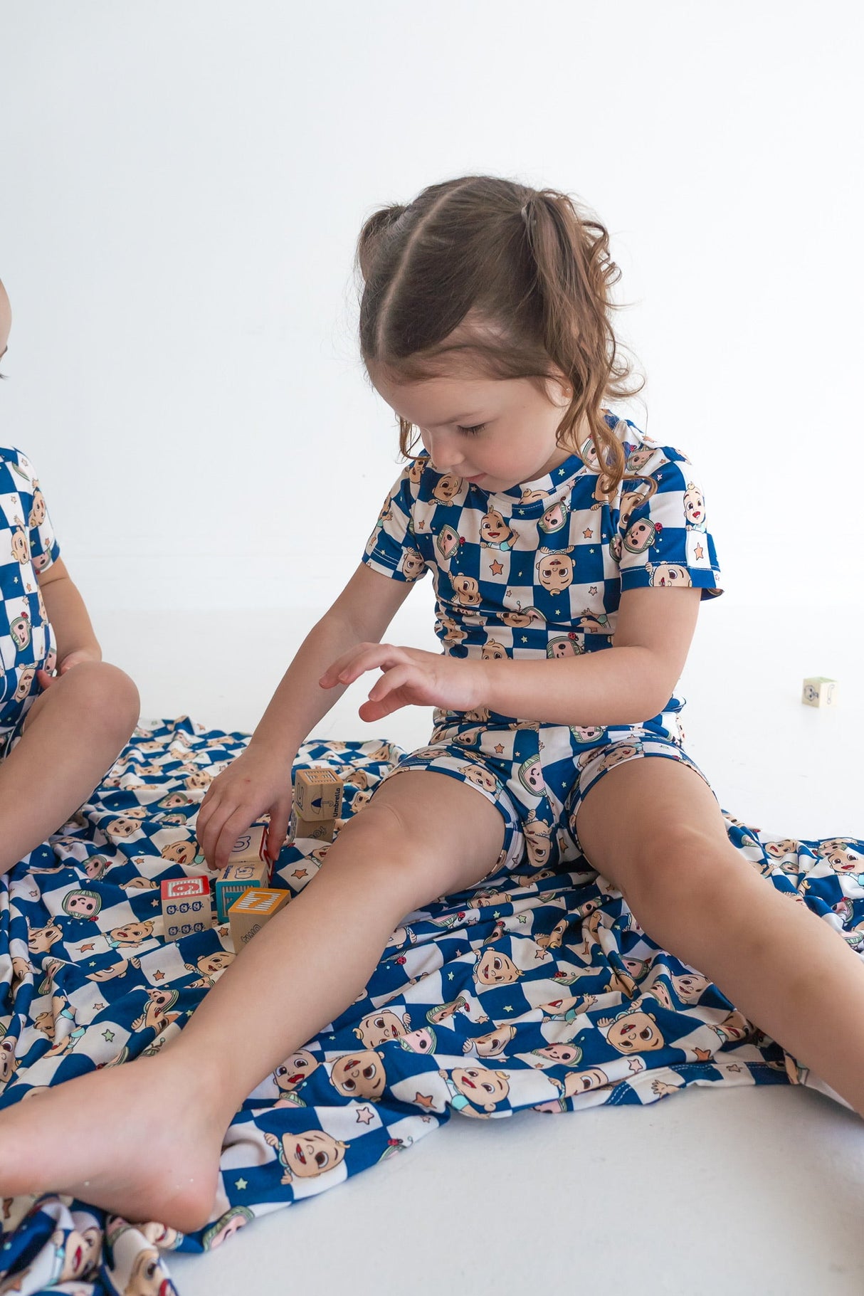 Dream Big Little Co x CoComelon JJ STARRY NIGHT CHECKERS DREAM SHORT SET from DREAM BIG LITTLE CO