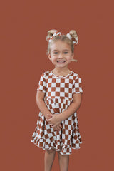 COPPER CHECKERS DREAM RUFFLE DRESS from DREAM BIG LITTLE CO