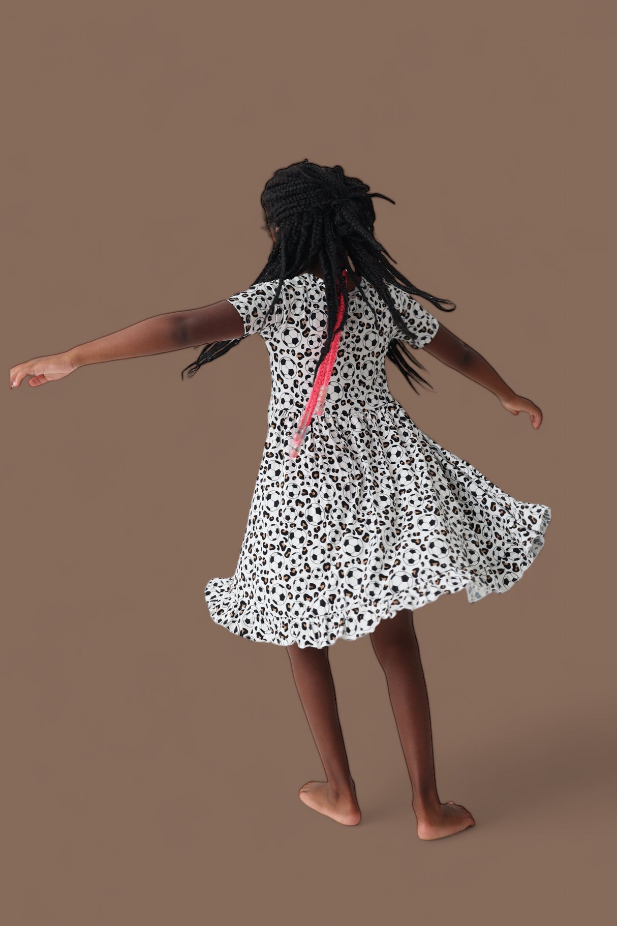WILD GOALS DREAM RUFFLE DRESS from DREAM BIG LITTLE CO