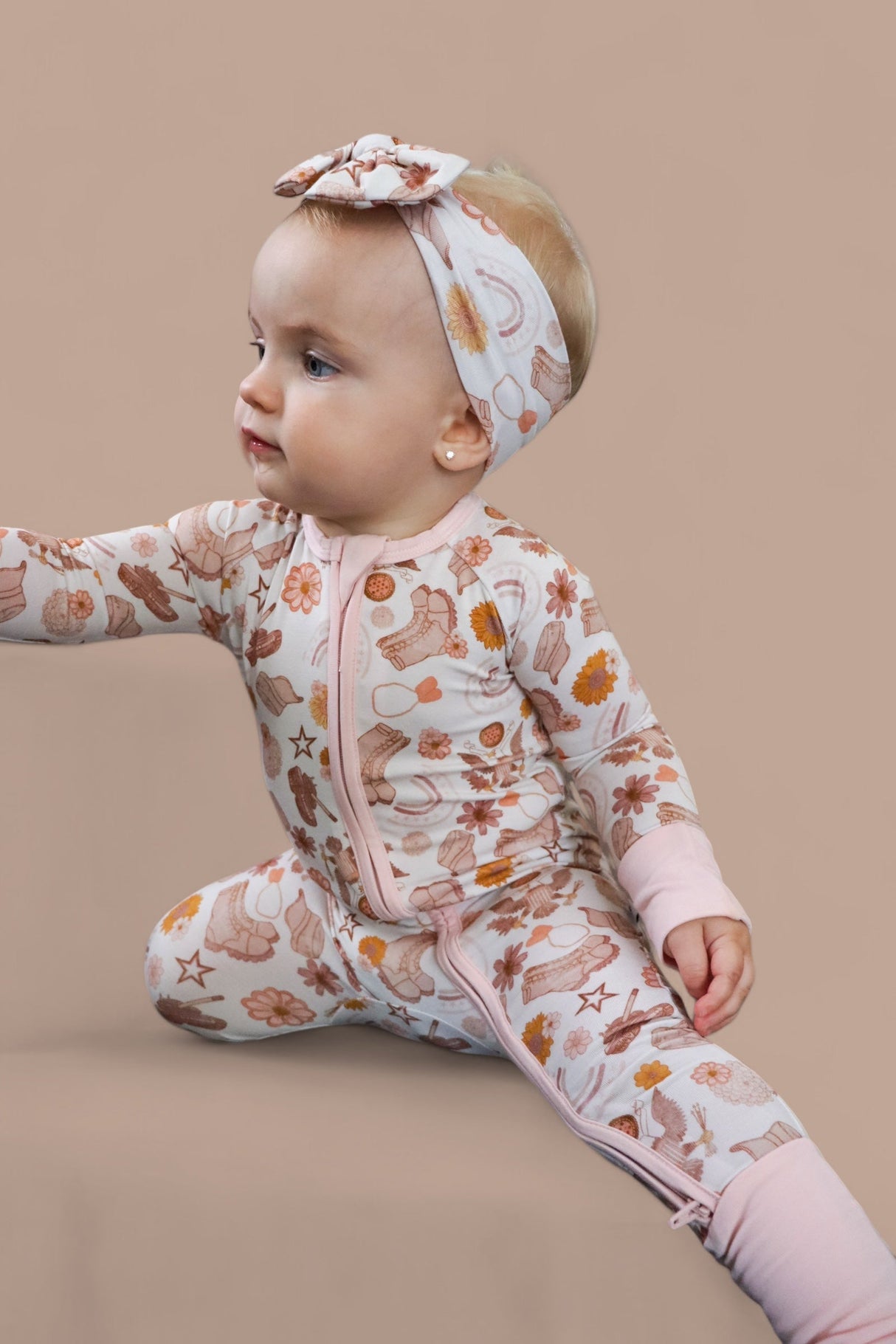 FLOWERS AND BOOTS DREAM ROMPER from DREAM BIG LITTLE CO