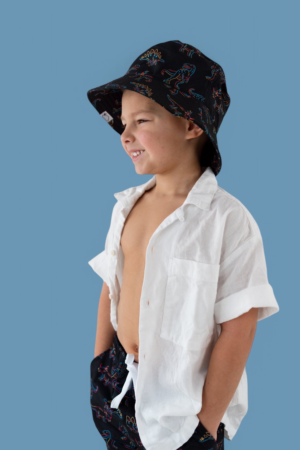 DINOSNORE DREAM BUCKET HAT from DREAM BIG LITTLE CO