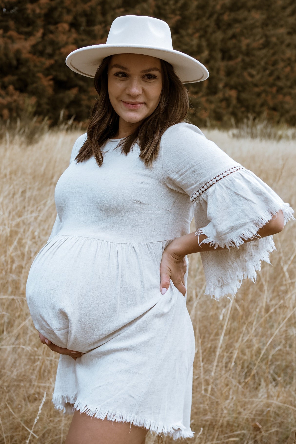Beige Raw Edge Bell Sleeve Babydoll Maternity Dress from PinkBlush