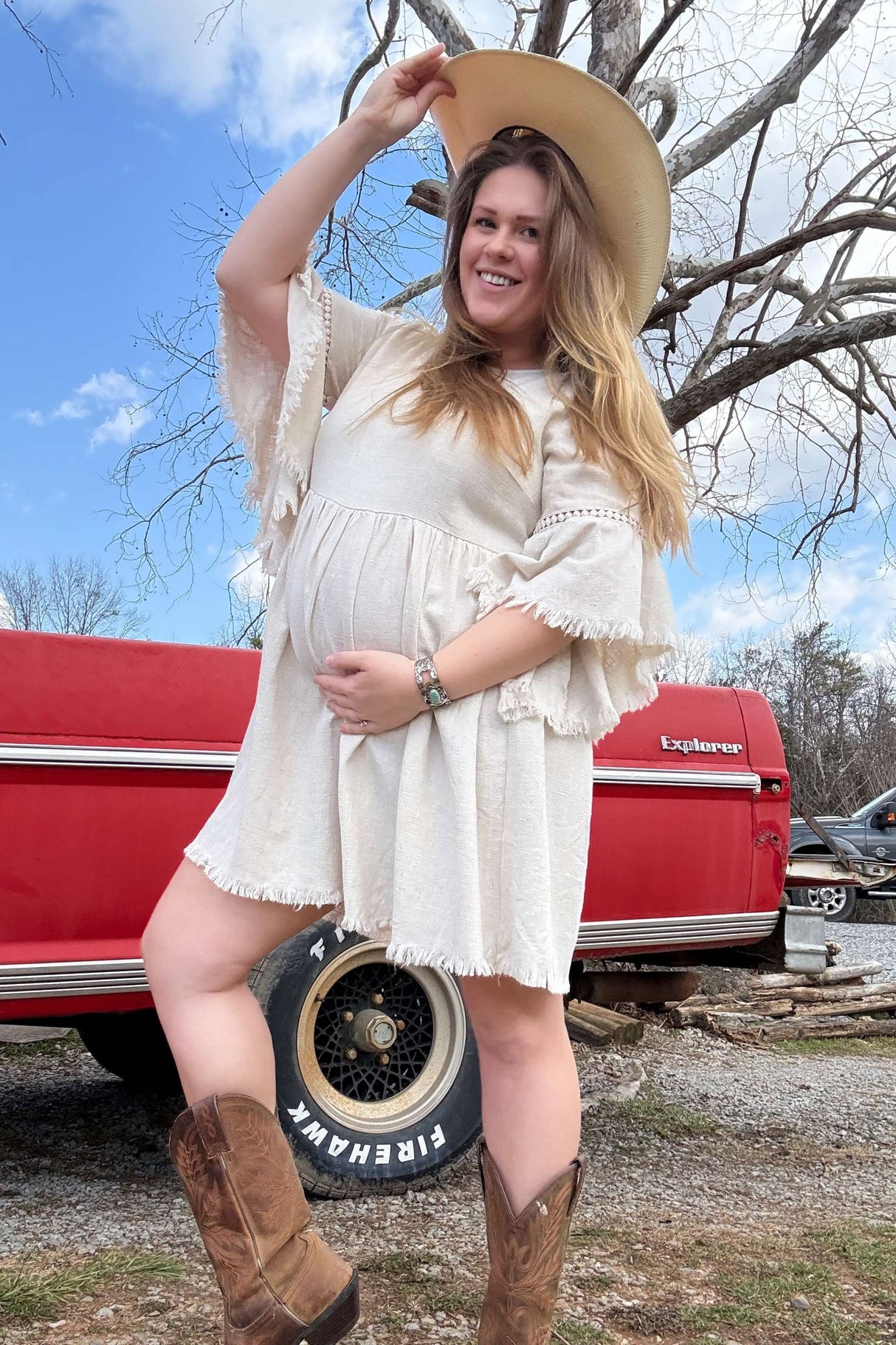 Beige Raw Edge Bell Sleeve Babydoll Maternity Dress from PinkBlush