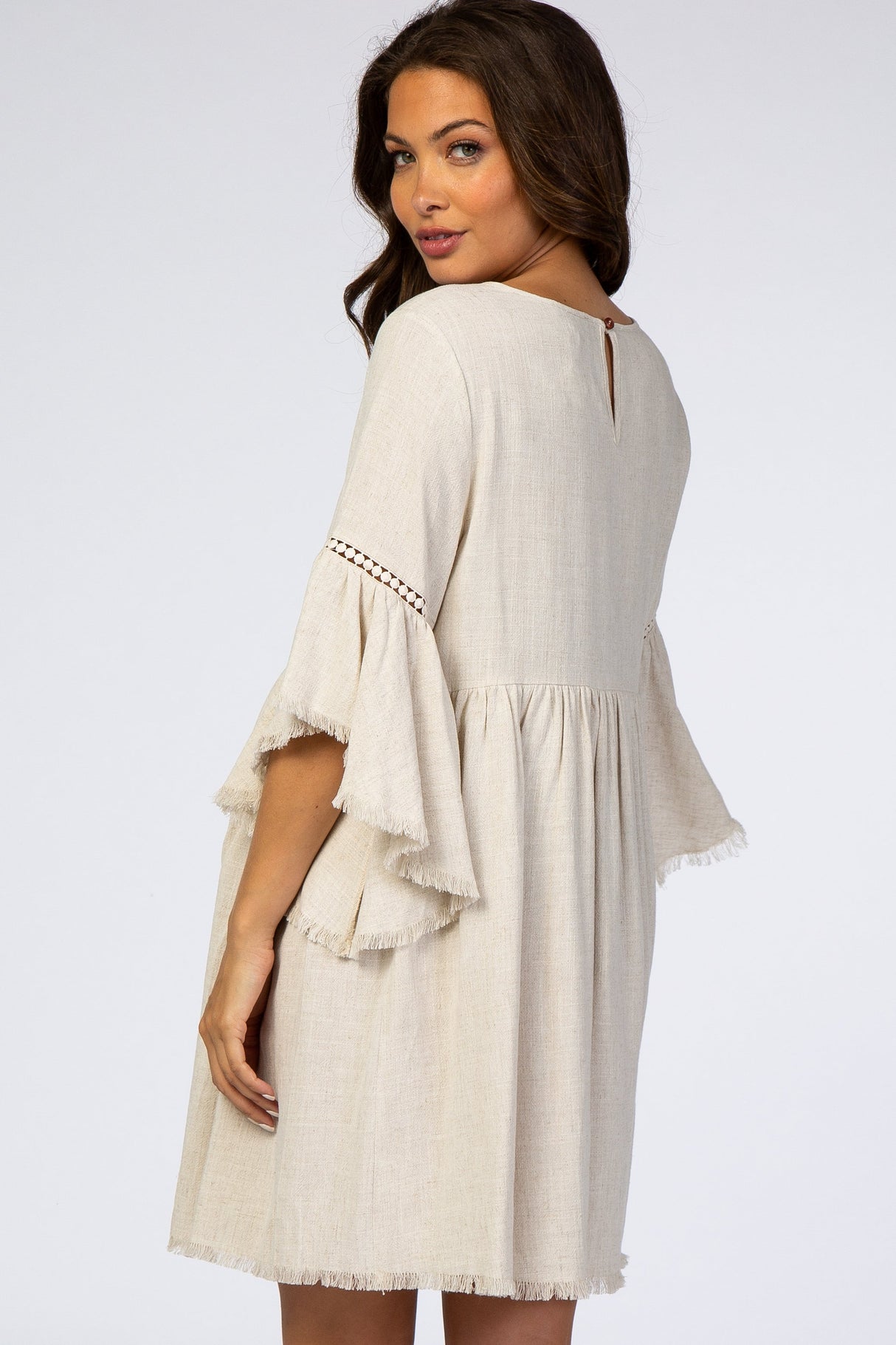 Beige Raw Edge Bell Sleeve Babydoll Maternity Dress from PinkBlush
