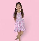 BUBBLEGUM WAVY CHECKERS DREAM RUFFLE DRESS from DREAM BIG LITTLE CO