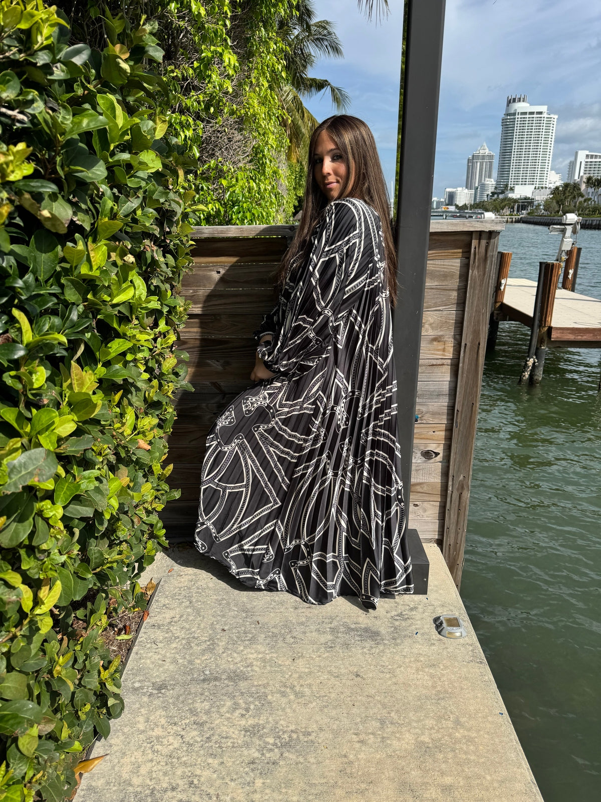 Black Horseshoe Beauty Pleated Dress From Drama NYC Plus