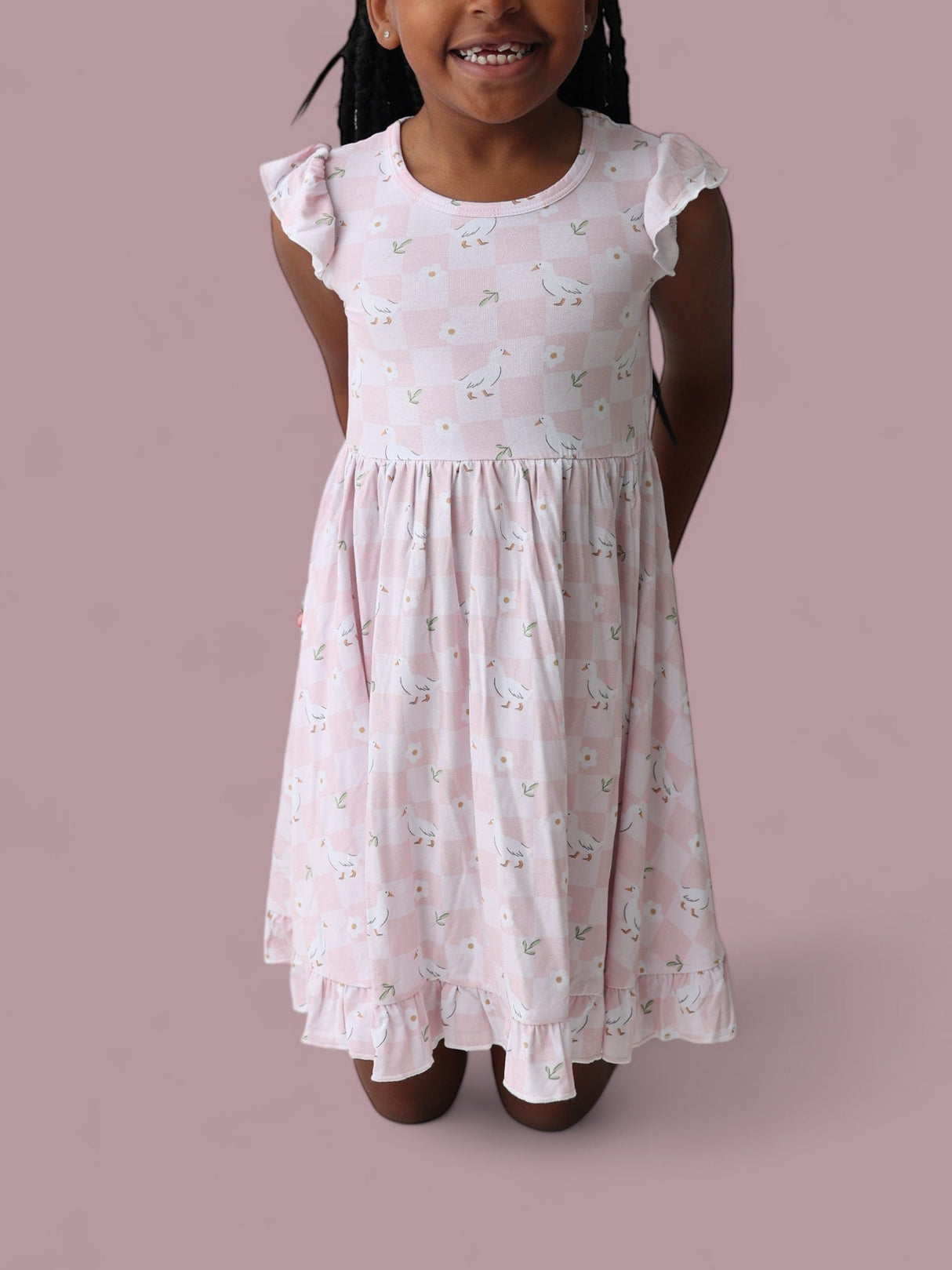 EXCLUSIVE DUCKS AND DAISIES DREAM CAP SLEEVE RUFFLE DRESS from DREAM BIG LITTLE CO