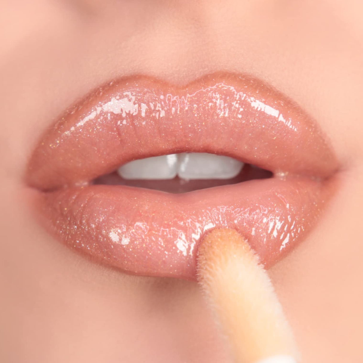REVOLUTION Shimmer Bomb Lip Gloss from VIAI BEAUTY