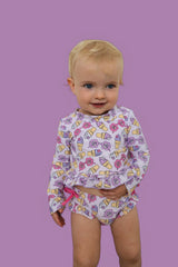 SWEET SUMMER DREAM RASH GUARD RUFFLE TWO-PIECE SWIM SUIT from DREAM BIG LITTLE CO