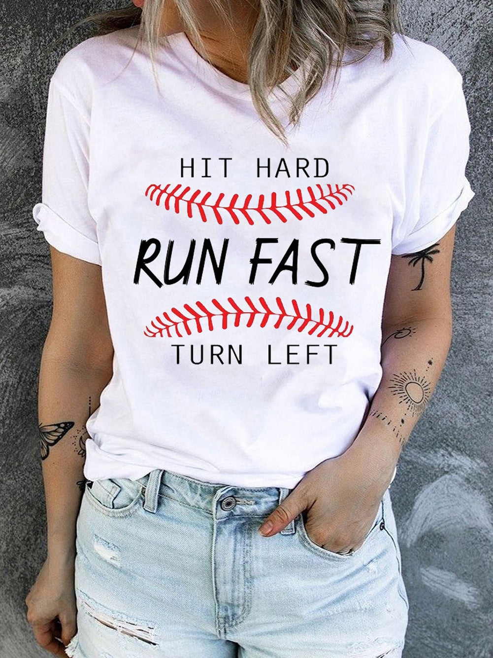 Baseball Print White Tee with "Hit Hard Run Fast Turn Left" Design from MsDressly