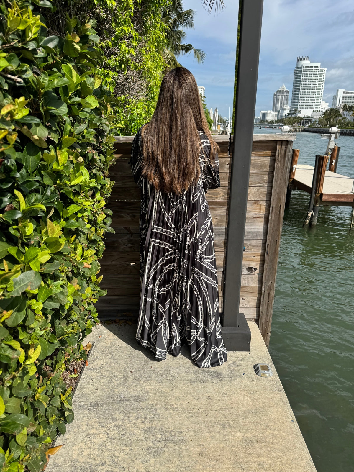 Black Horseshoe Beauty Pleated Dress From Drama NYC Plus