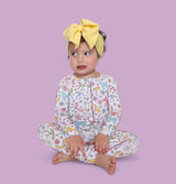 BOW GARDEN DREAM RUFFLE ROMPER from DREAM BIG LITTLE CO