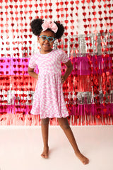 BUBBLEGUM WAVY CHECKERS DREAM RUFFLE DRESS from DREAM BIG LITTLE CO