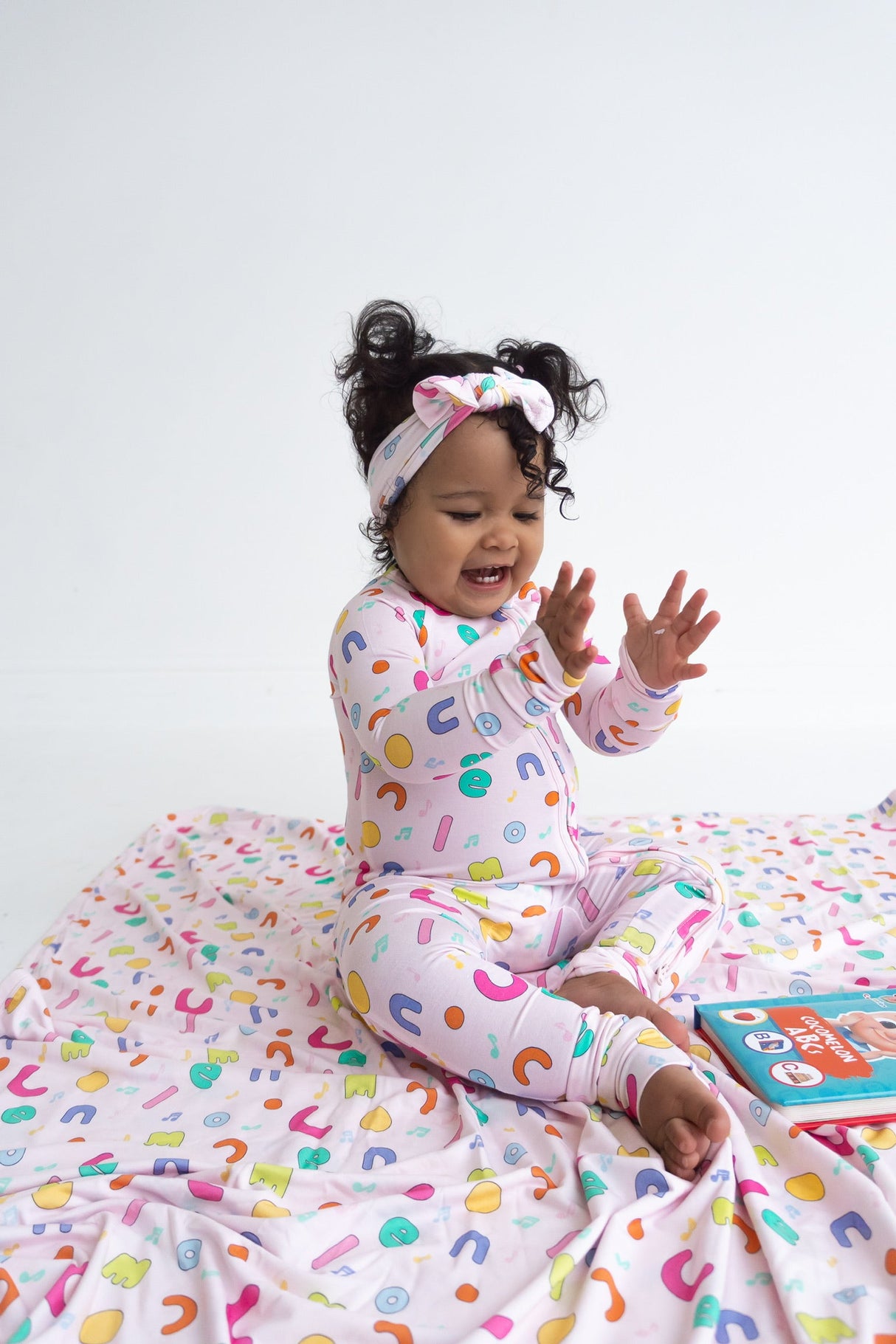 Dream Big Little Co x CoComelon ALPHABET DREAM ROMPER from DREAM BIG LITTLE CO