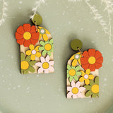 70s Burnt Orange Floral Arch Earrings from LE CHIC MIAMI