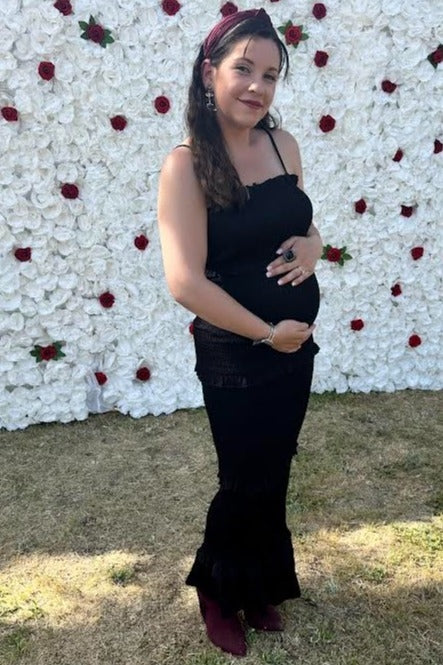 Black Satin Smocked Fitted Maternity Midi Dress from PinkBlush