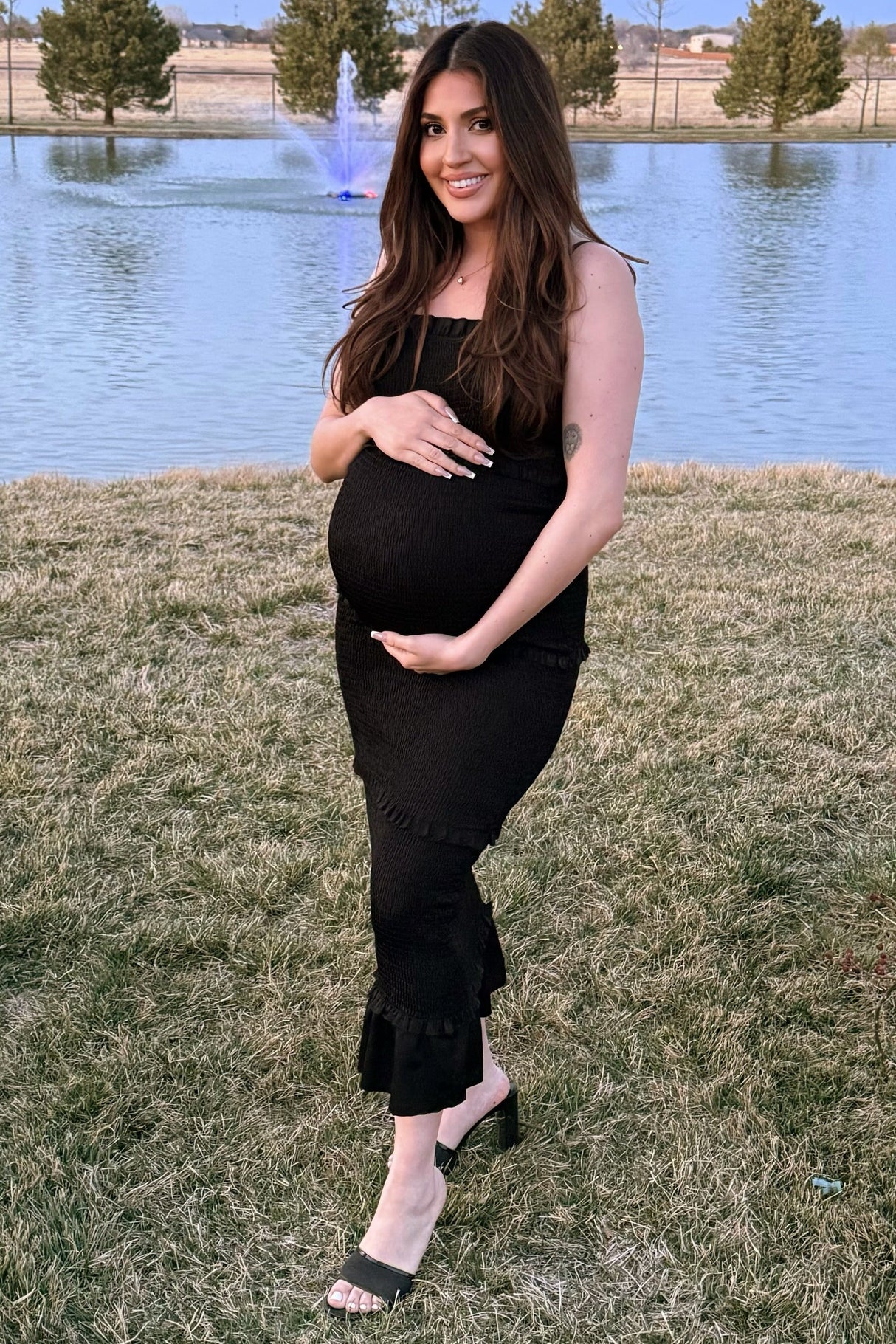 Black Satin Smocked Fitted Maternity Midi Dress from PinkBlush