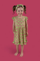 WILD DAISY CHECKERS DREAM RUFFLE DRESS from DREAM BIG LITTLE CO