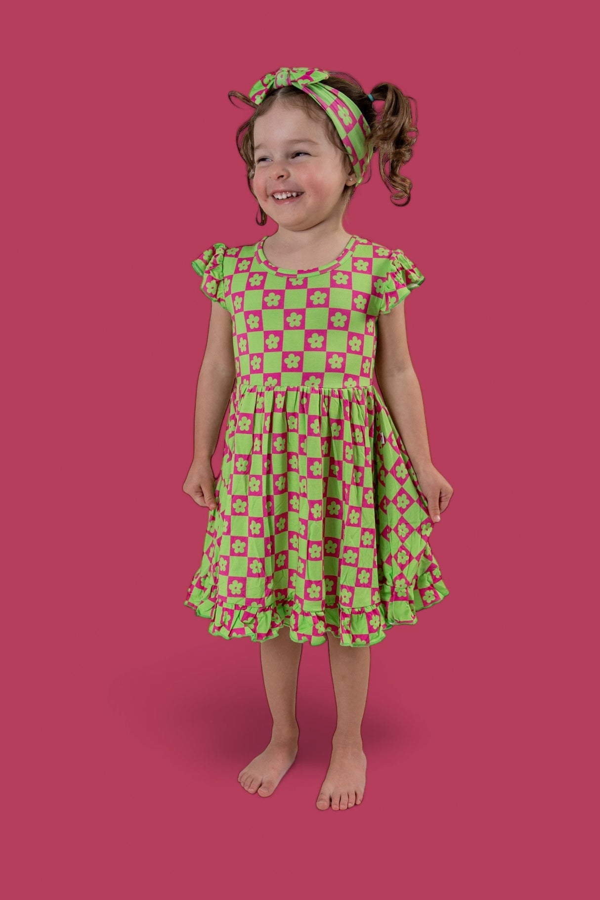 WILD DAISY CHECKERS DREAM RUFFLE DRESS from DREAM BIG LITTLE CO