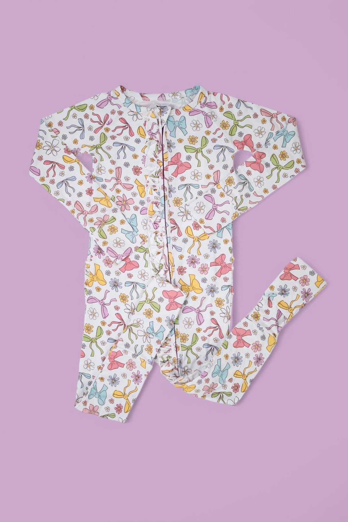 BOW GARDEN DREAM RUFFLE ROMPER from DREAM BIG LITTLE CO