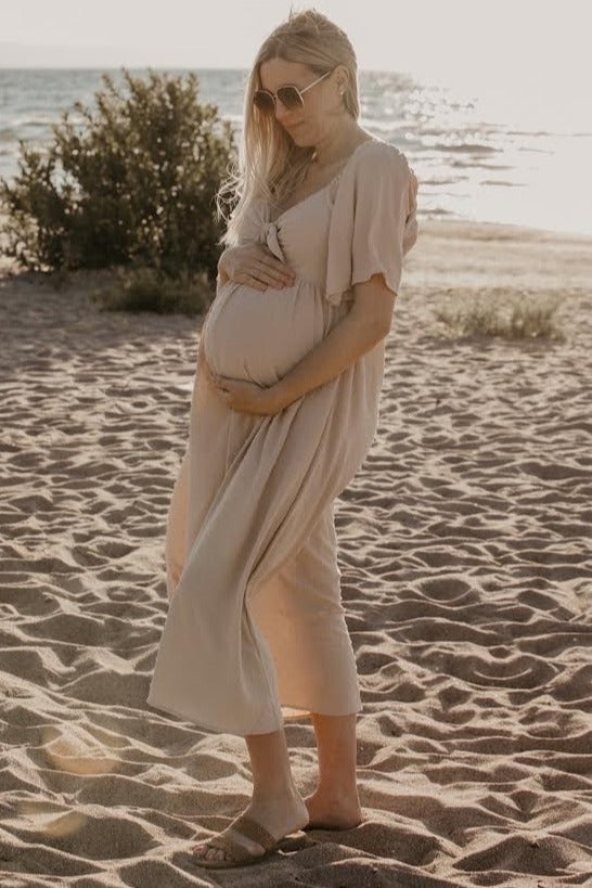 Beige Textured Dot Front Tie Ruffle Sleeve Maternity Midi Dress from PinkBlush