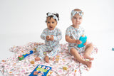 Dream Big Little Co x CoComelon SPRINGTIME MELON DREAM RUFFLE ROMPER from DREAM BIG LITTLE CO