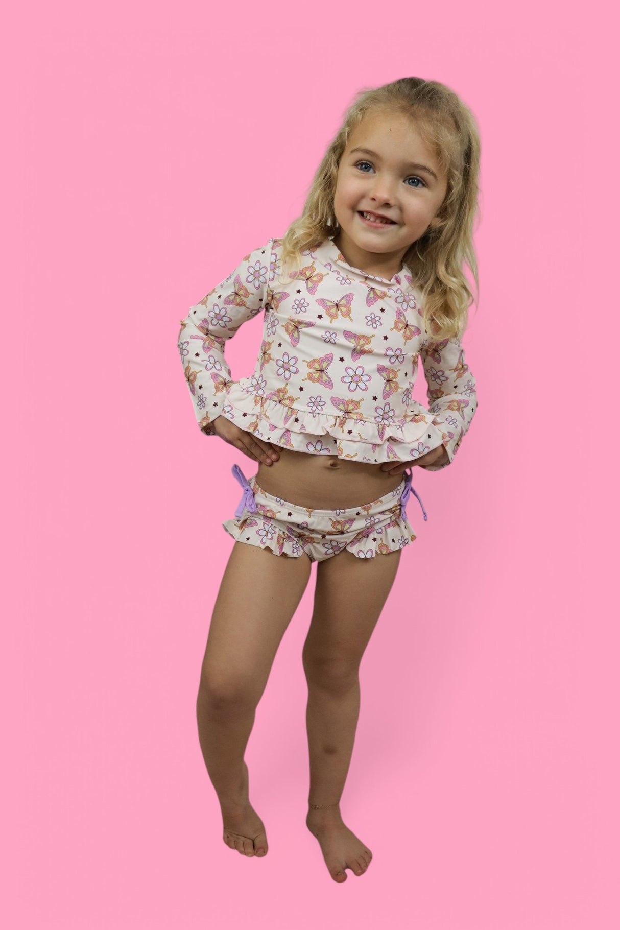 BLOSSOMIN’ BUTTERFLY DREAM 2-PIECE RASH GUARD RUFFLE SWIM SUIT from DREAM BIG LITTLE CO
