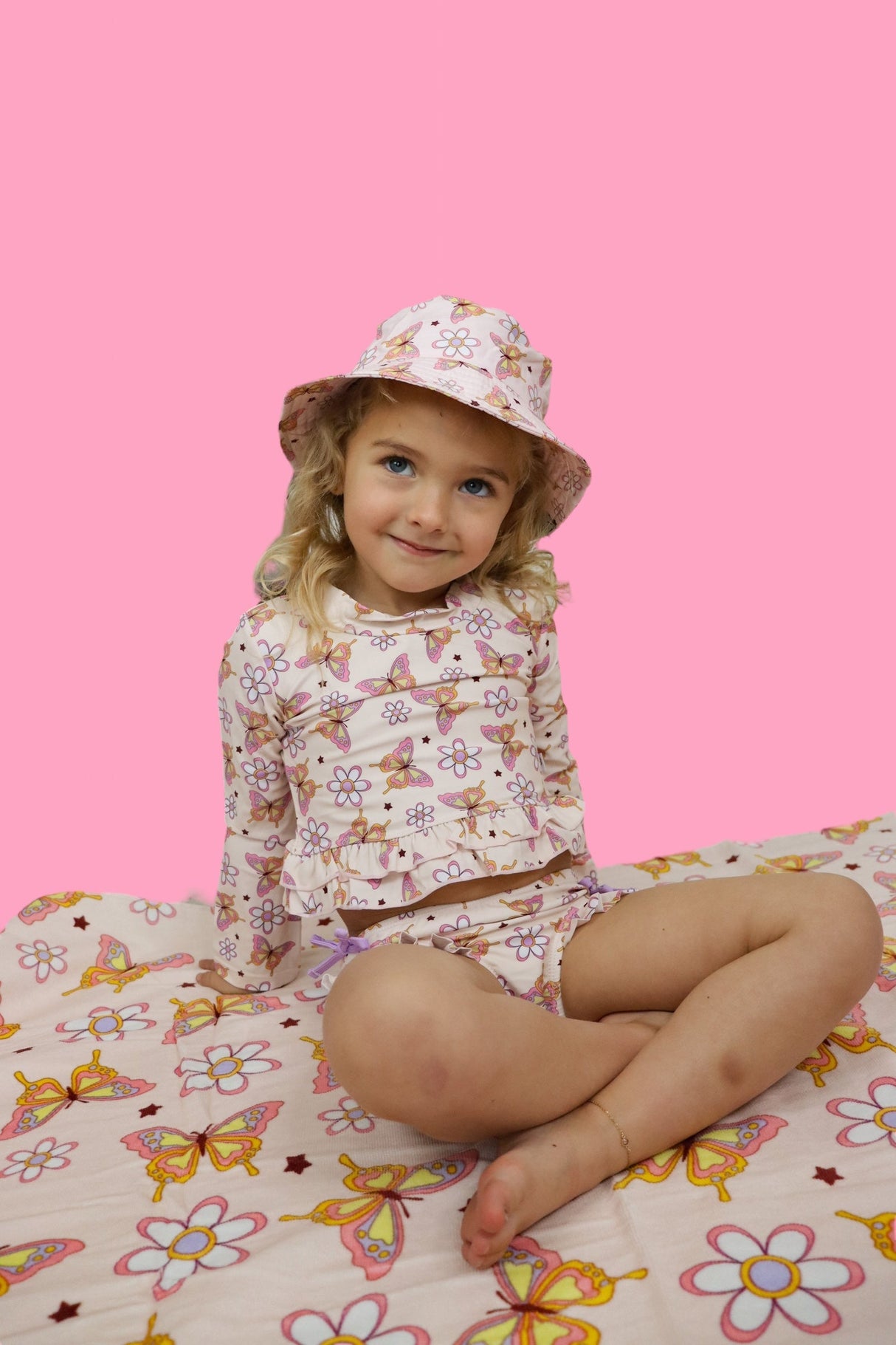 BLOSSOMIN’ BUTTERFLY DREAM 2-PIECE RASH GUARD RUFFLE SWIM SUIT from DREAM BIG LITTLE CO