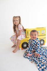 Dream Big Little Co x CoComelon JJ STARRY NIGHT CHECKERS DREAM ROMPER from DREAM BIG LITTLE CO