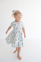 Dream Big Little Co x CoComelon SPRINGTIME MELON SHORT SLEEVE DREAM RUFFLE DRESS from DREAM BIG LITTLE CO