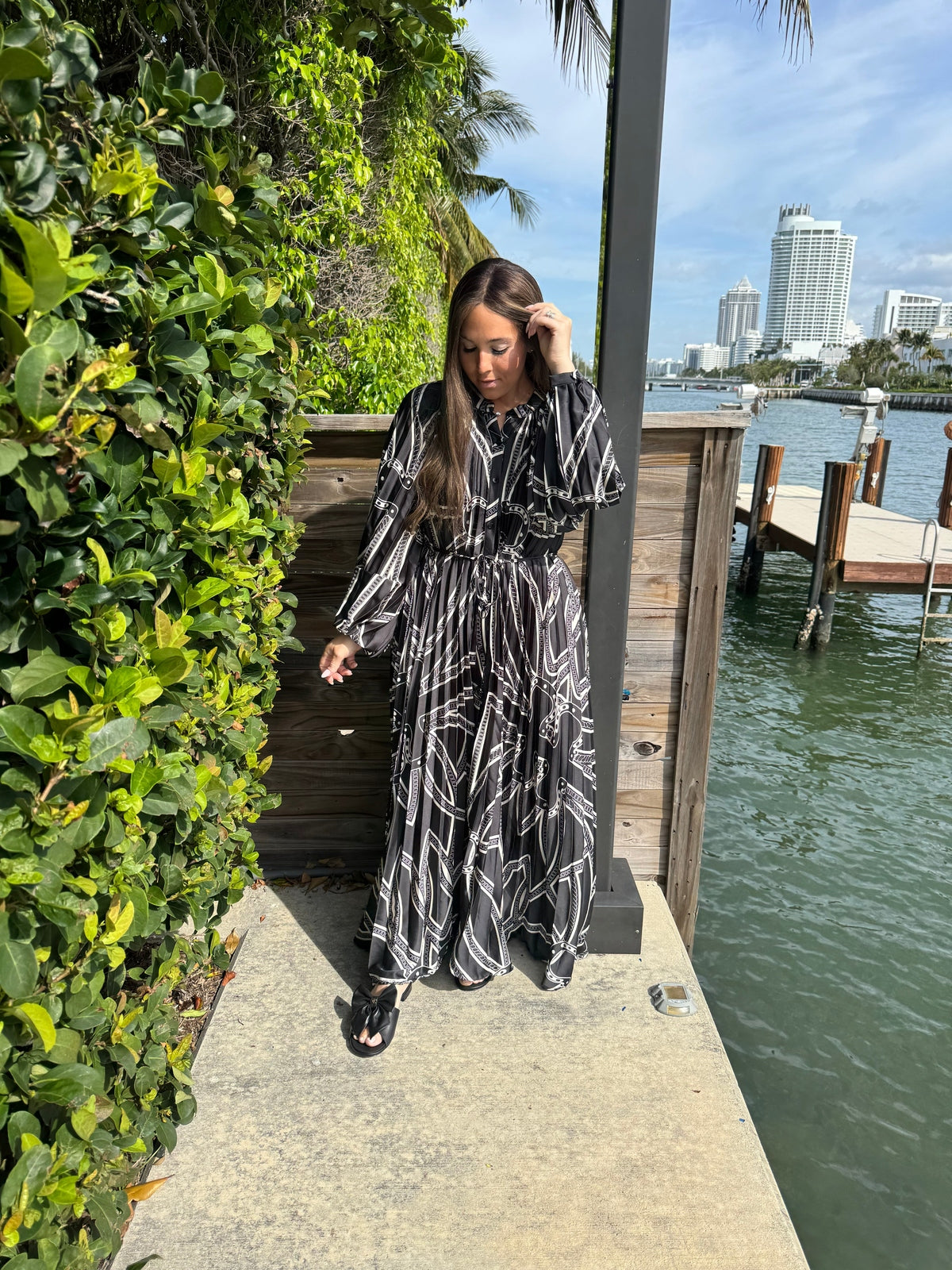 Black Horseshoe Beauty Pleated Dress From Drama NYC Plus