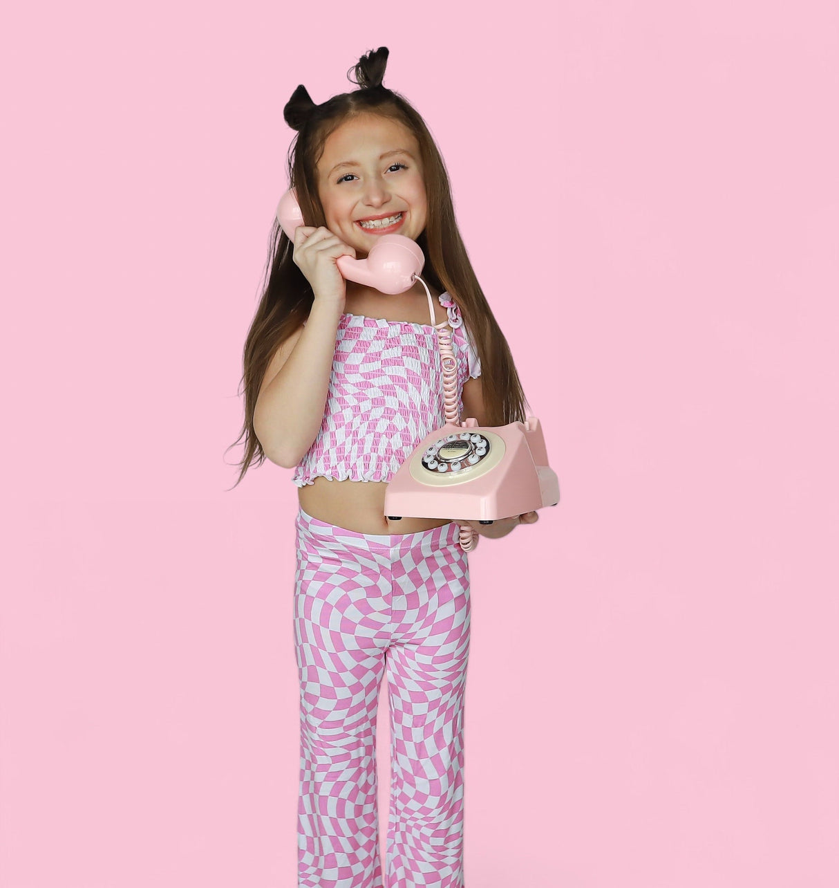 BUBBLEGUM WAVY CHECKERS DREAM SMOCKED FLARE SET from DREAM BIG LITTLE CO