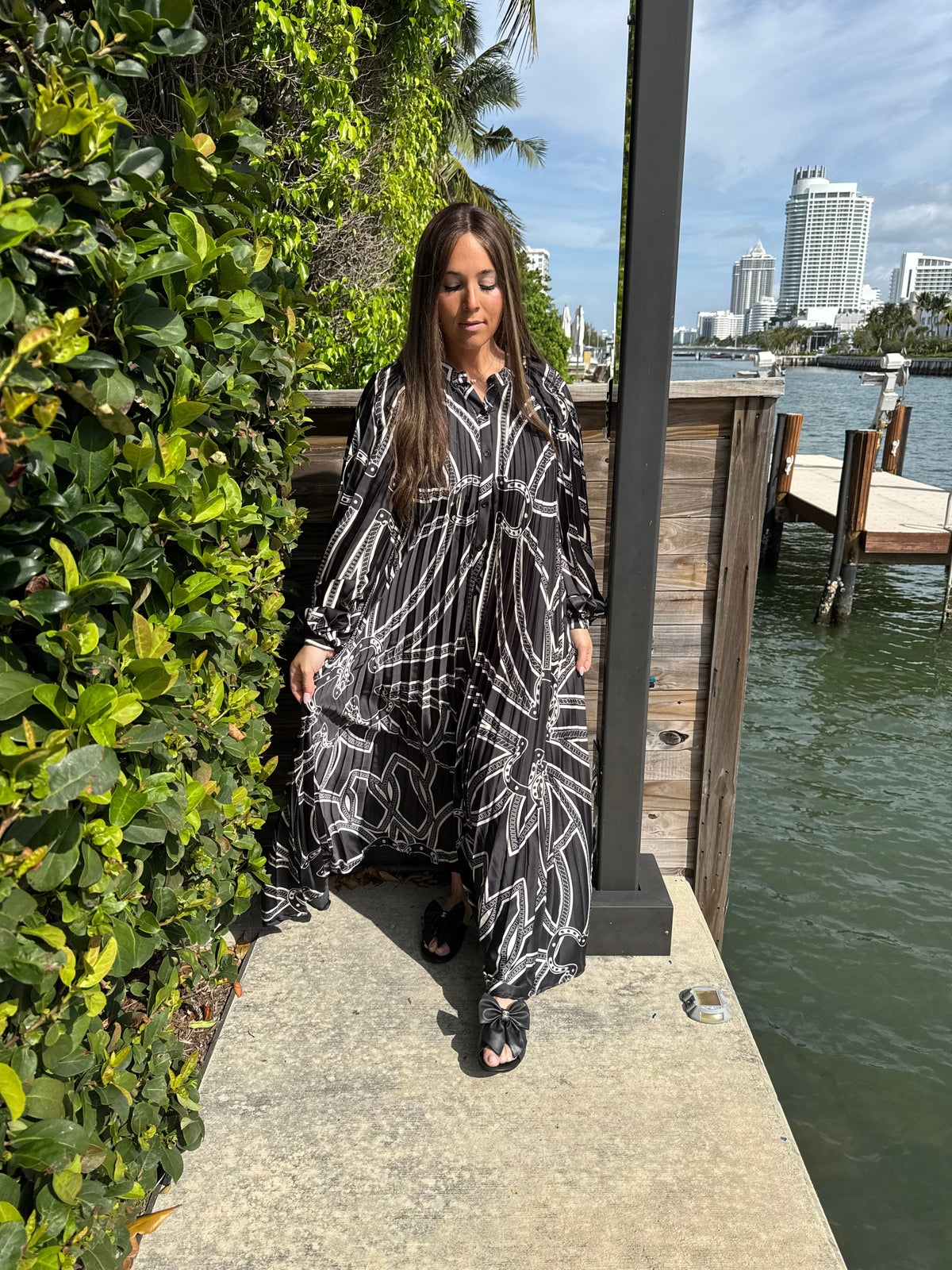 Black Horseshoe Beauty Pleated Dress From Drama NYC Plus