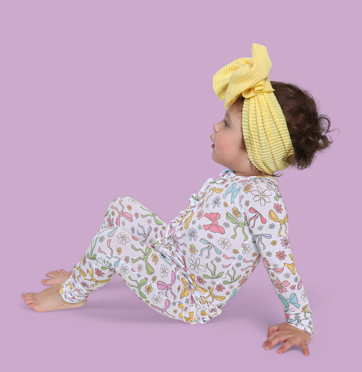 BOW GARDEN DREAM RUFFLE ROMPER from DREAM BIG LITTLE CO