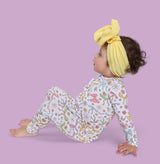 BOW GARDEN DREAM RUFFLE ROMPER from DREAM BIG LITTLE CO