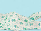 BLUE RIBBON BLOOMS DREAM RUFFLE ROMPER from DREAM BIG LITTLE CO
