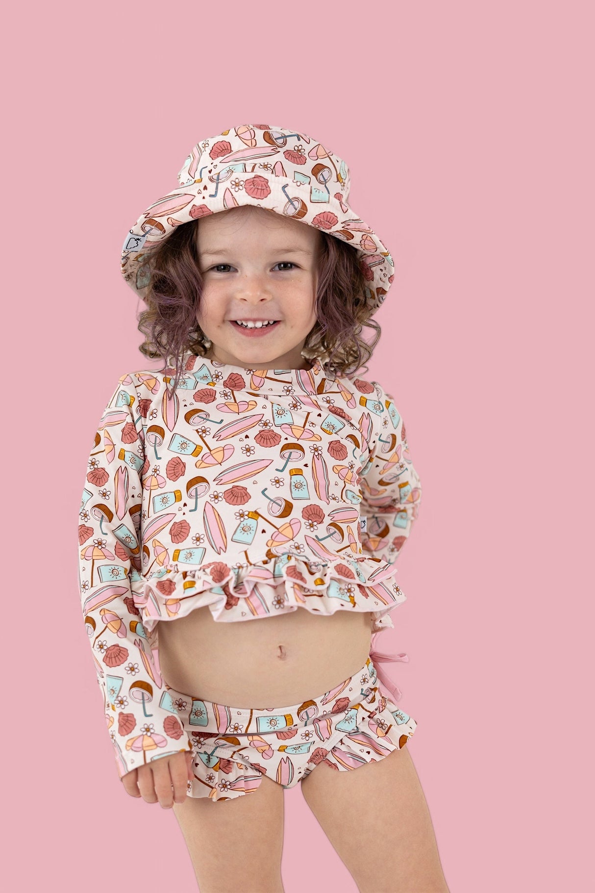 FUN IN THE SUN DREAM TWO-PIECE RASH GUARD RUFFLE SWIM SUIT from DREAM BIG LITTLE CO