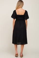 Black Smocked Puff Sleeve Maternity Midi Dress from PinkBlush