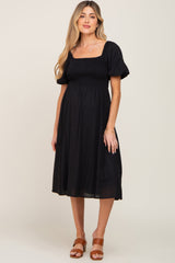 Black Smocked Puff Sleeve Maternity Midi Dress from PinkBlush