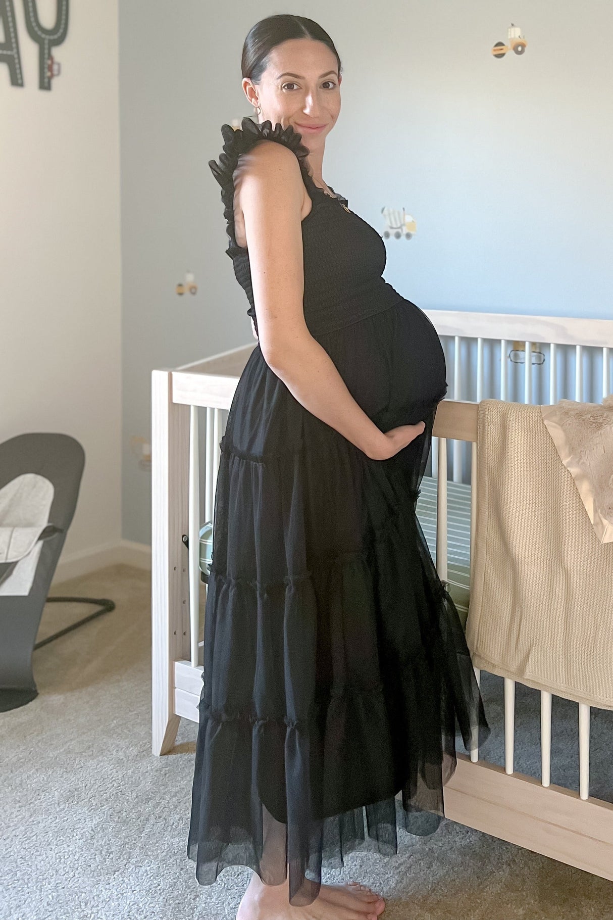 Black Smocked Mesh Ruffle Accent Maternity Midi Dress from PinkBlush