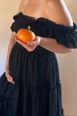 Black Smocked Mesh Ruffle Accent Maternity Midi Dress from PinkBlush